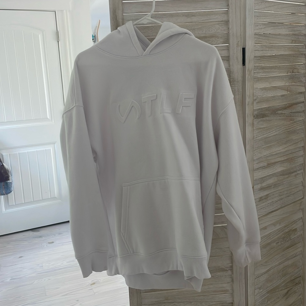 White TLF sweatshirt, never worn size S/M